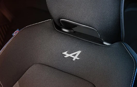 Blue, white and red top-stitching on steering wheel